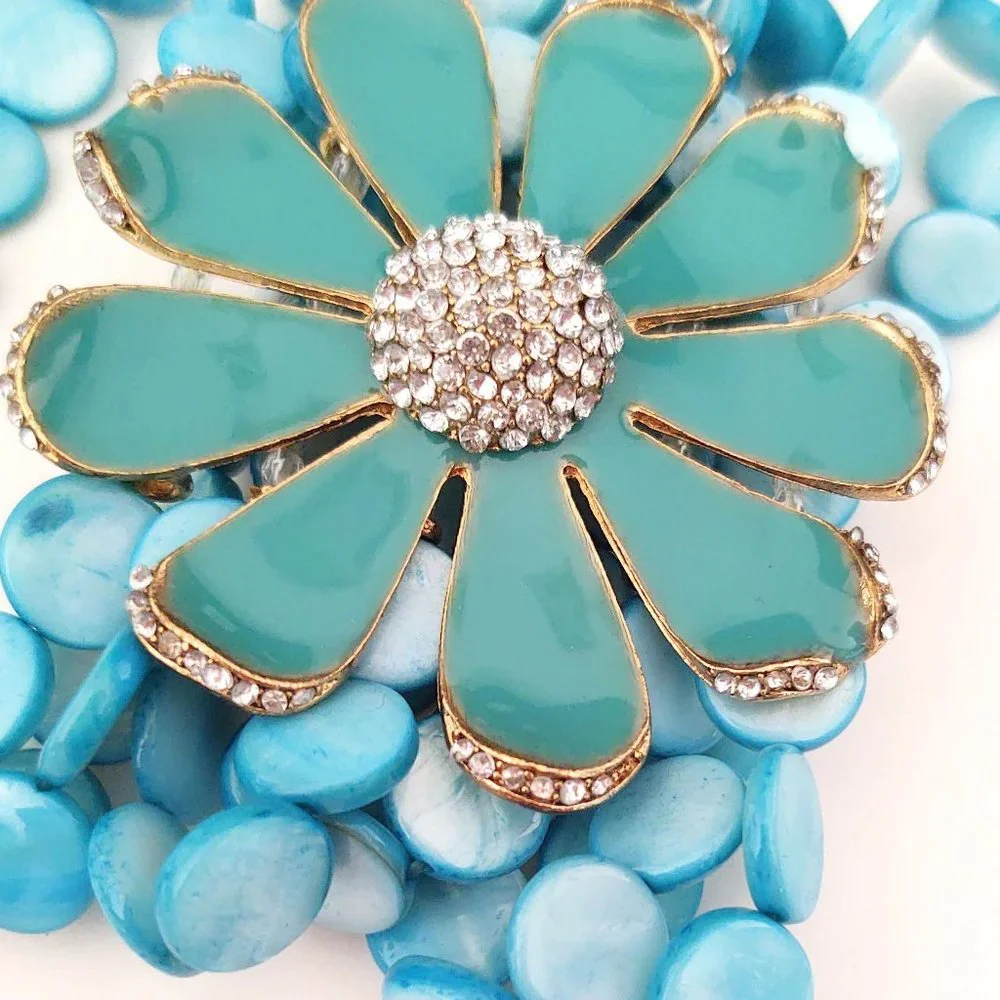 Dyed shell stretch bracelet w/enamel flower& cz's
